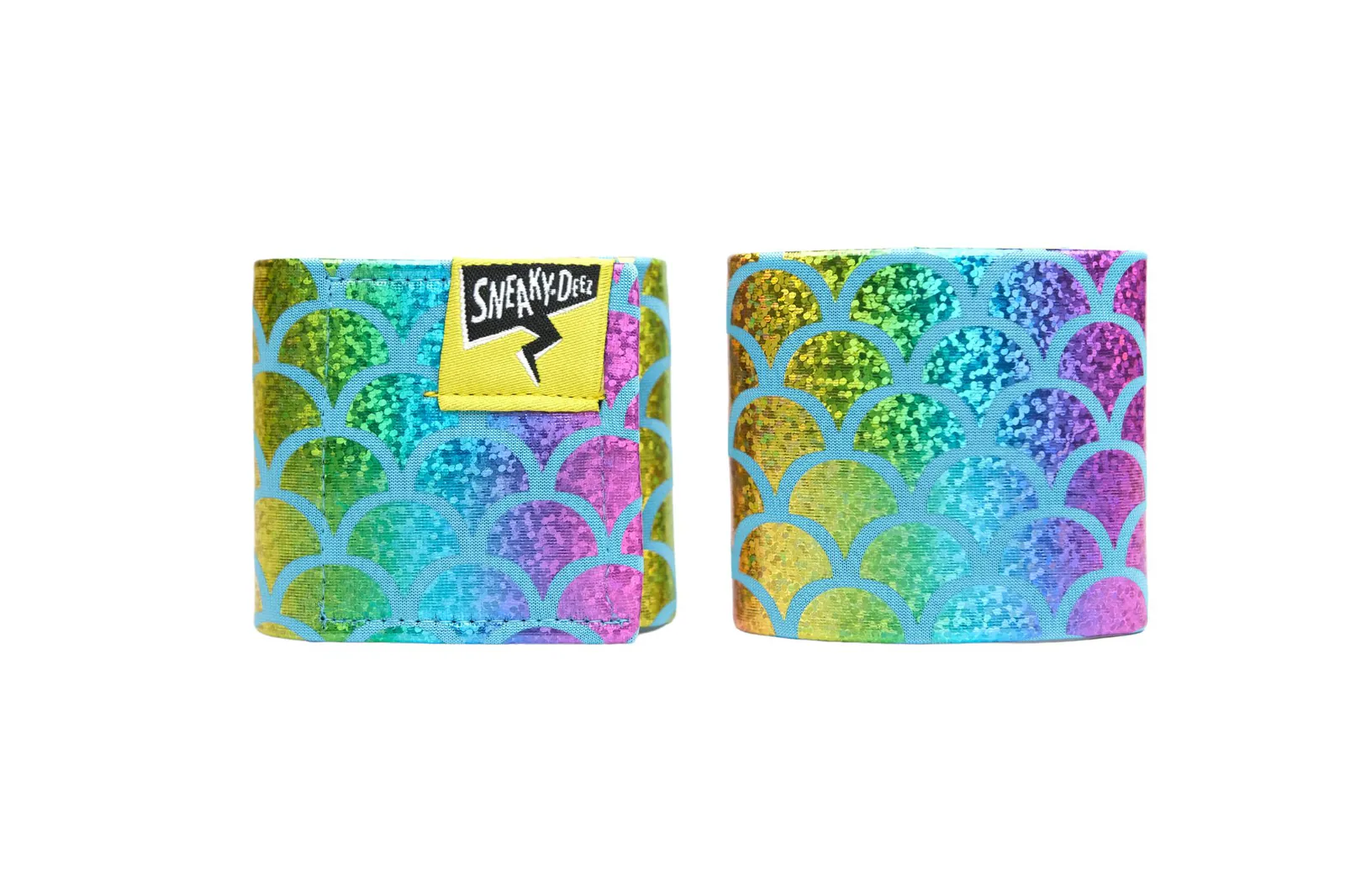 A pair of SneakyDeez wrist wraps in a sparkly rainbow mermaid-scale print on a white background
