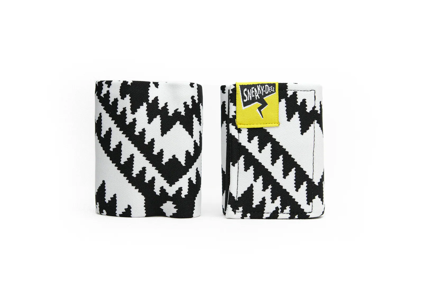 A pair of black and white tribal-print SneakyDeez wrist wraps in the 8 cm width, standing side by side on a white background